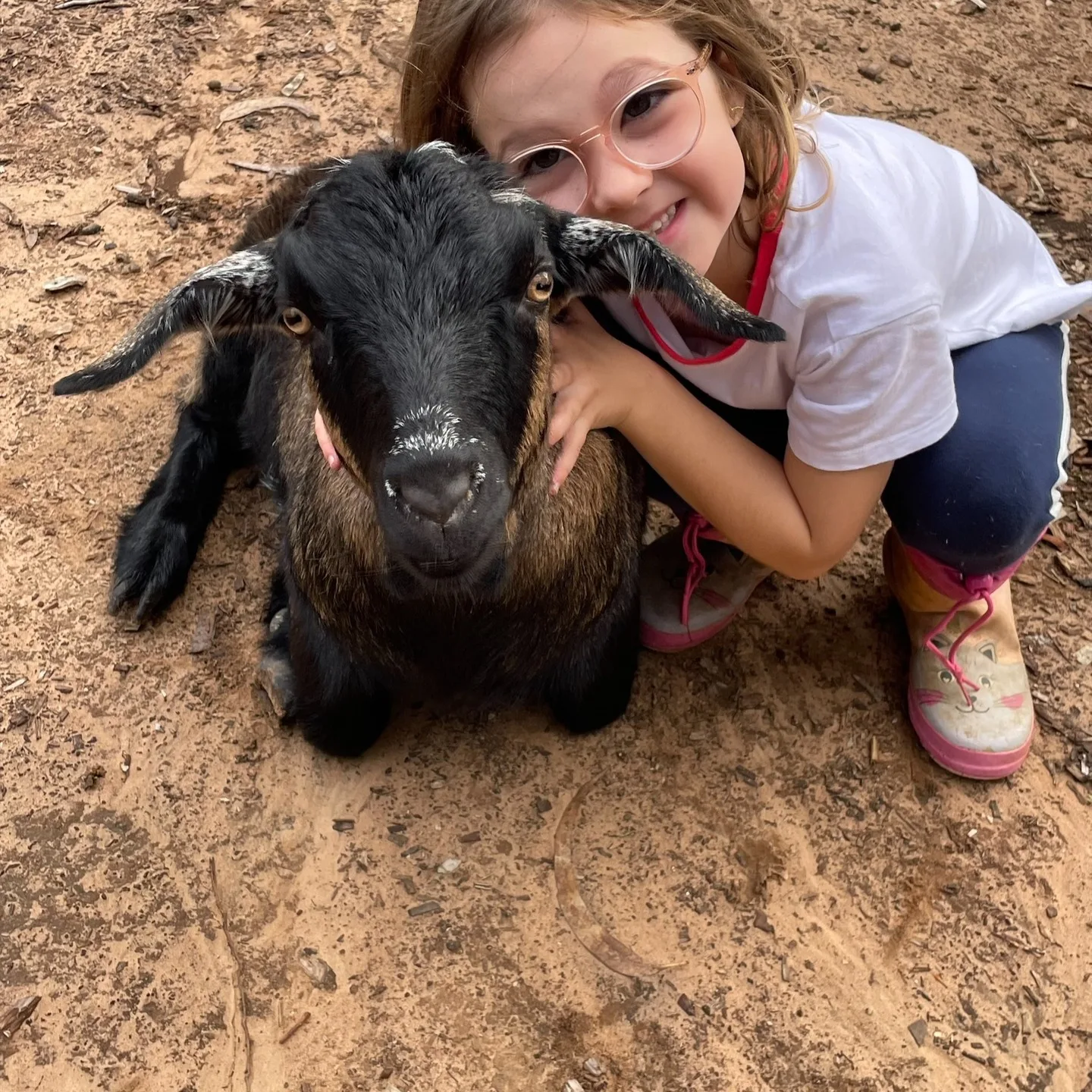 Child with Jemima the goat